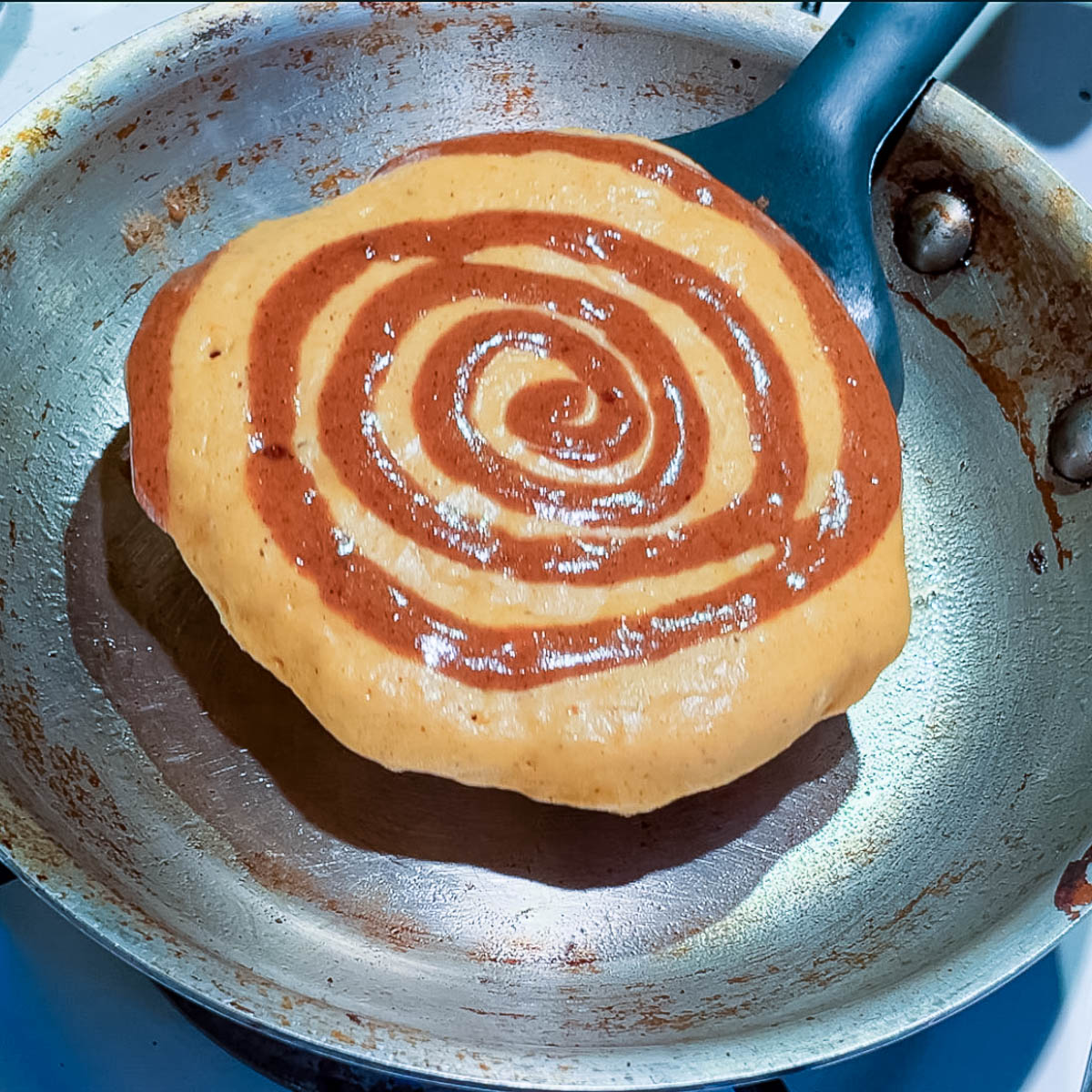 Cinnamon pancakes on the pan.