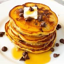 A stack of pancakes with pumpkin puree.
