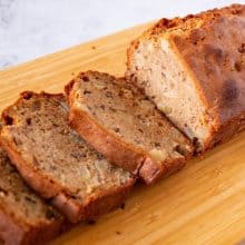 An apple bread cake with fresh apples.
