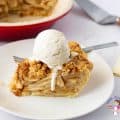 A plate of apple pie with vanilla ice cream