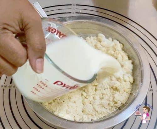 Add the milk to the dough