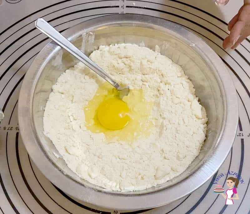 Add the egg to the flour mixture