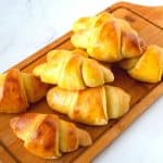 Pumpkin Crescents on a wooden board.