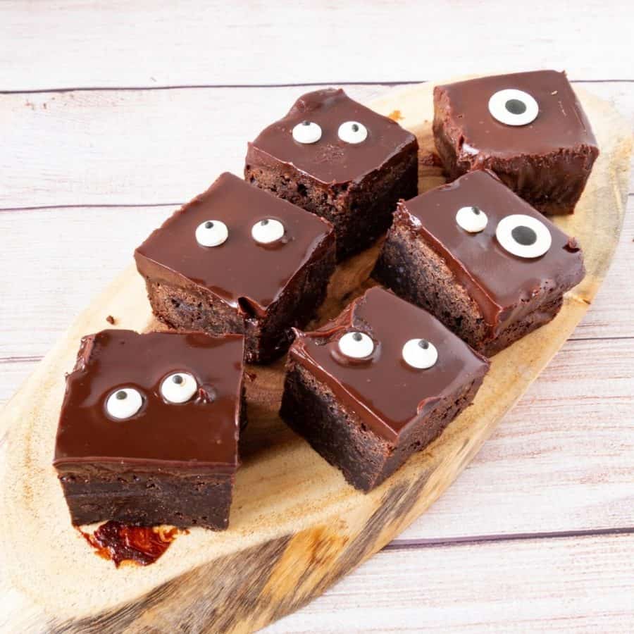 Brownies with google eyes and glaze.