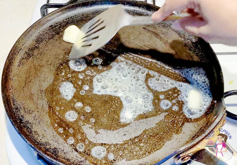 Smear the skillet with butter