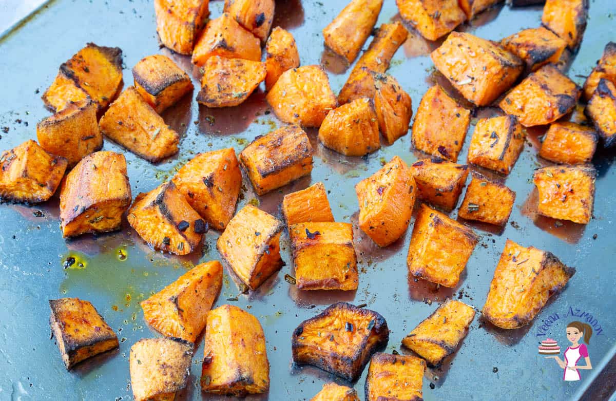 Cubes of baked sweet potato on a baking tray