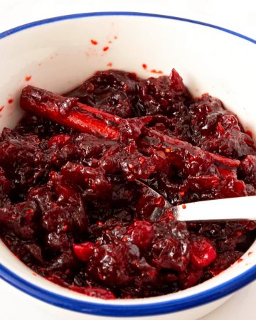 A bowl with cranberry sauce.