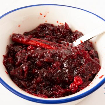 A white bowl with cranberry condiments