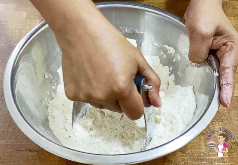 cut the veg shortening and butter into the flour