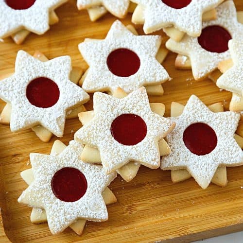 Star shaped Christmas cookies in an oven tray before baking Stock