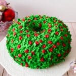 A wreath cake on a cake stand