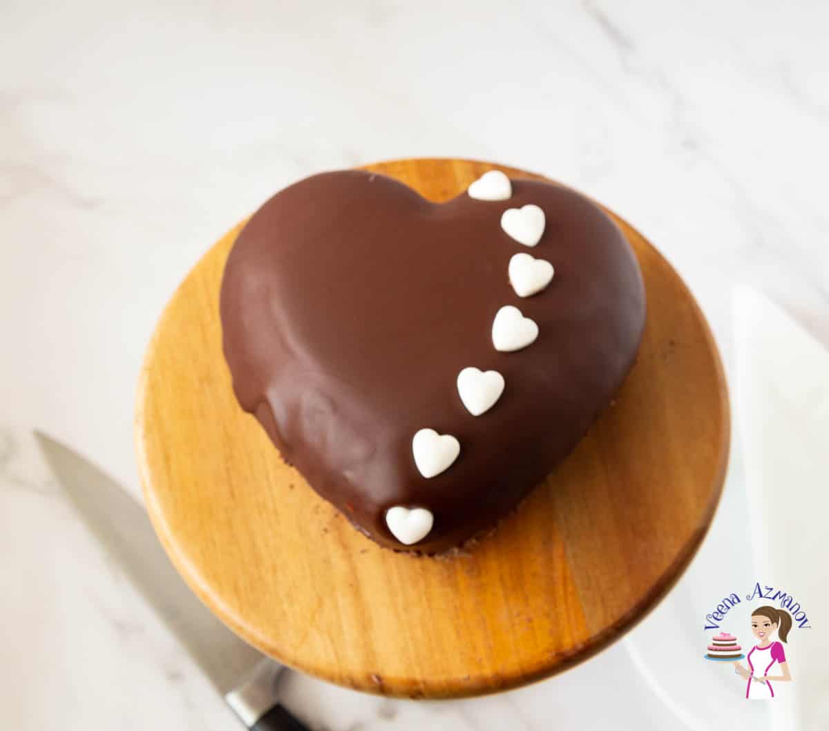 Heart mousse cake on a cake stand