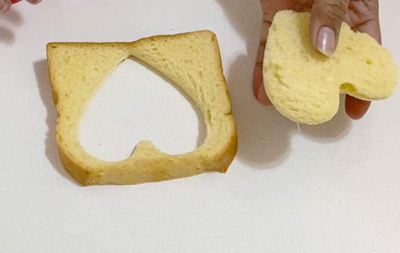 Cutting the heart shape bread