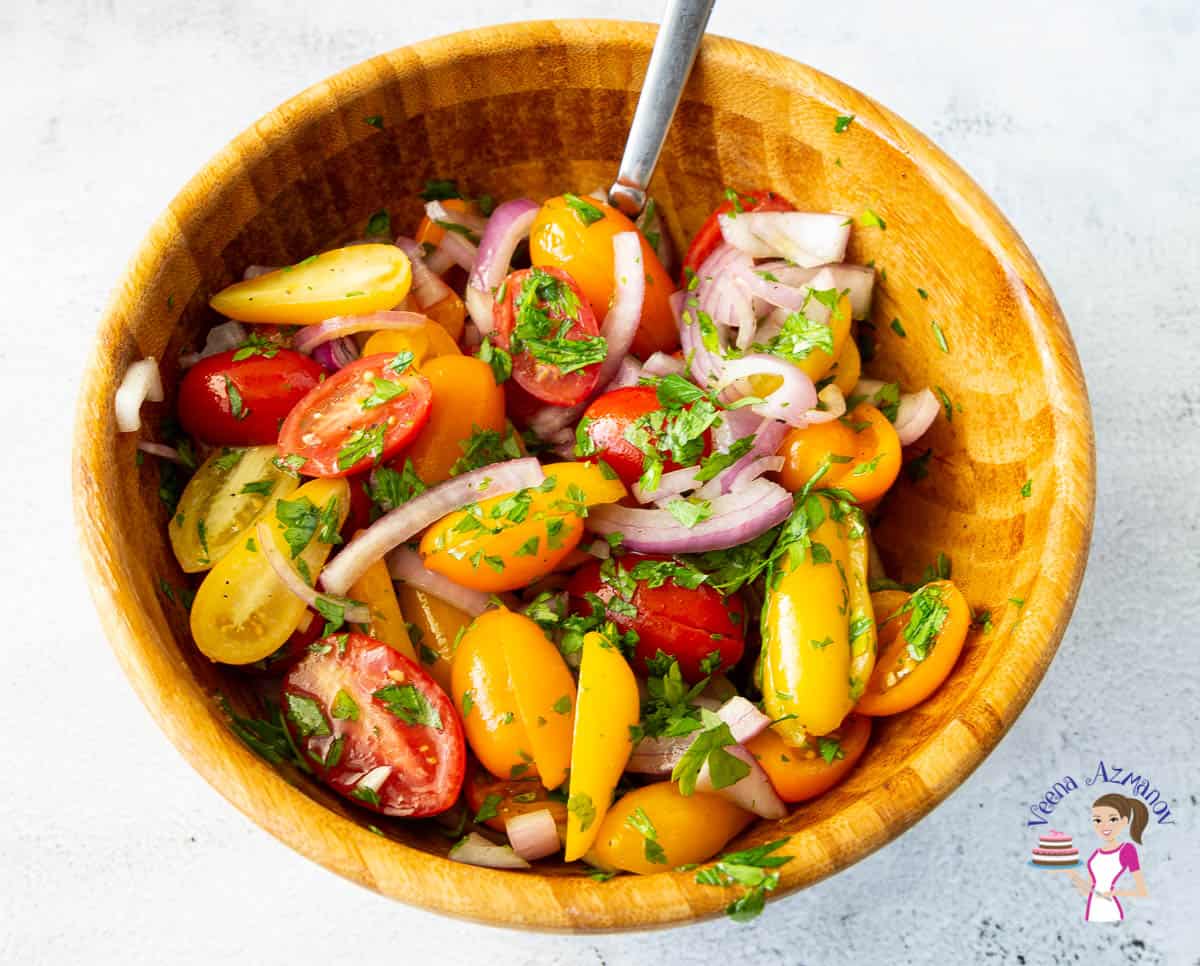 A salad bowl with salad made with tomatoes