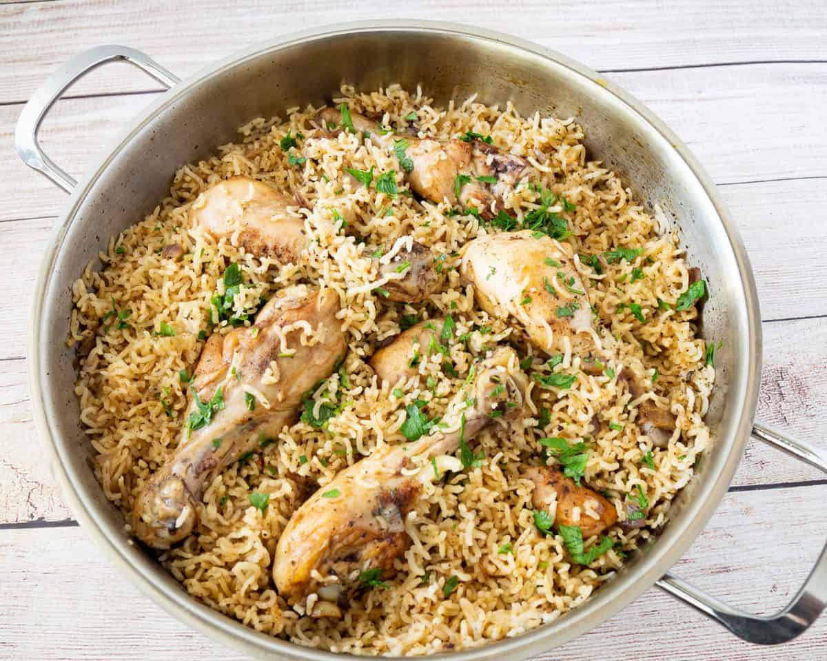 Skillet with rice and chicken.