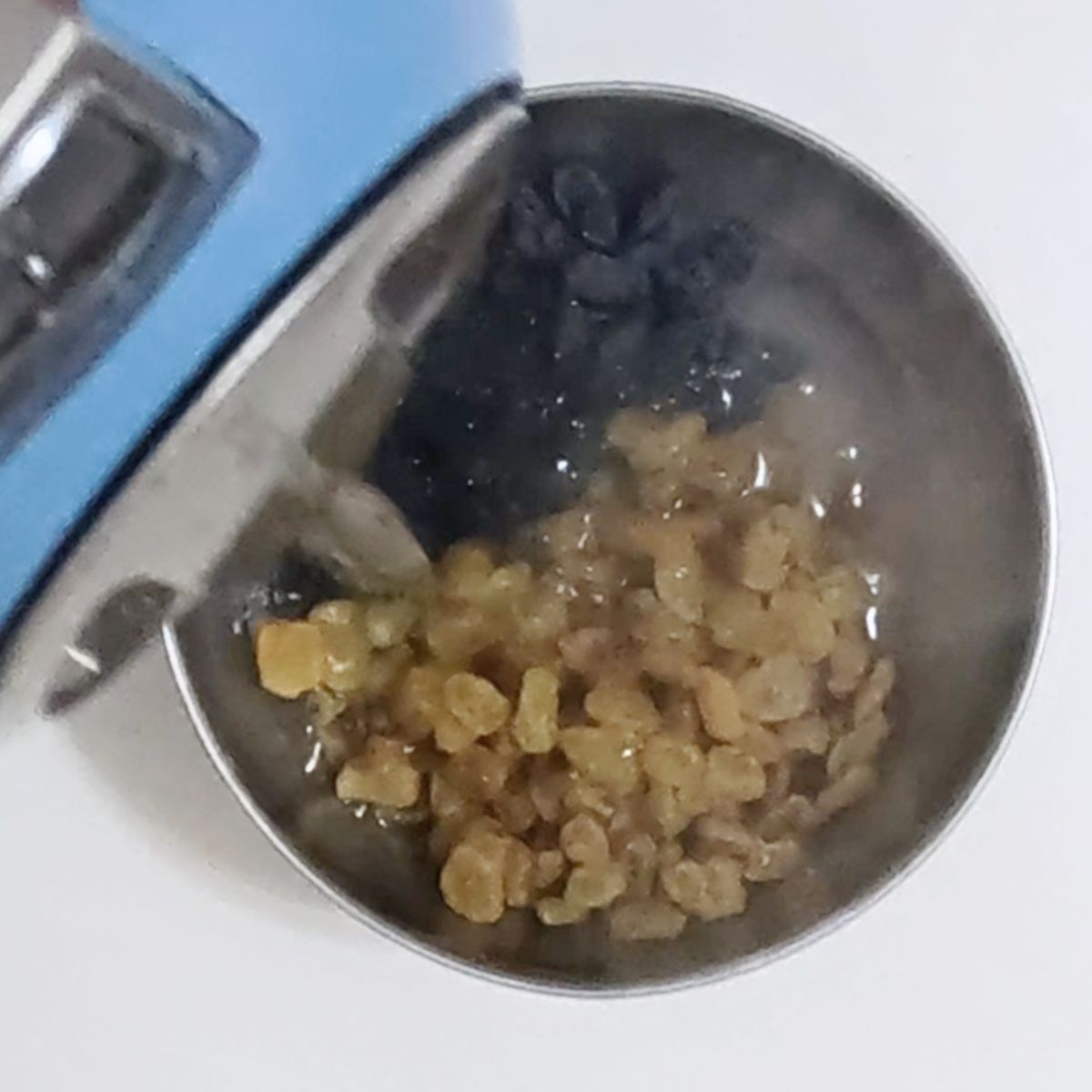 Soak the raisins and currants with hot water.