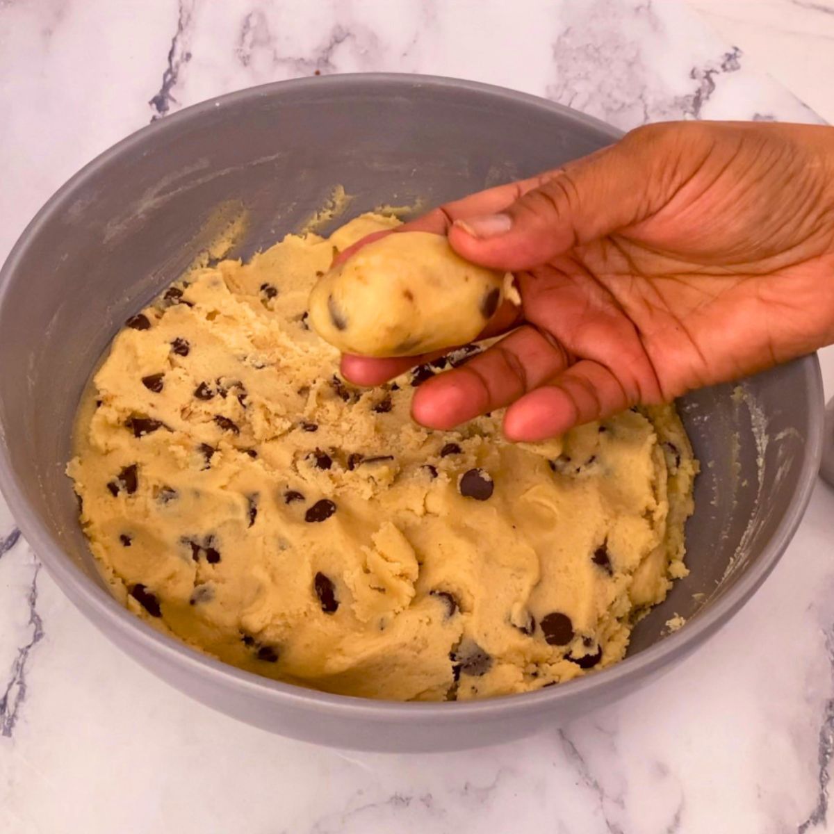 An oval ball of cookie dough for baking.