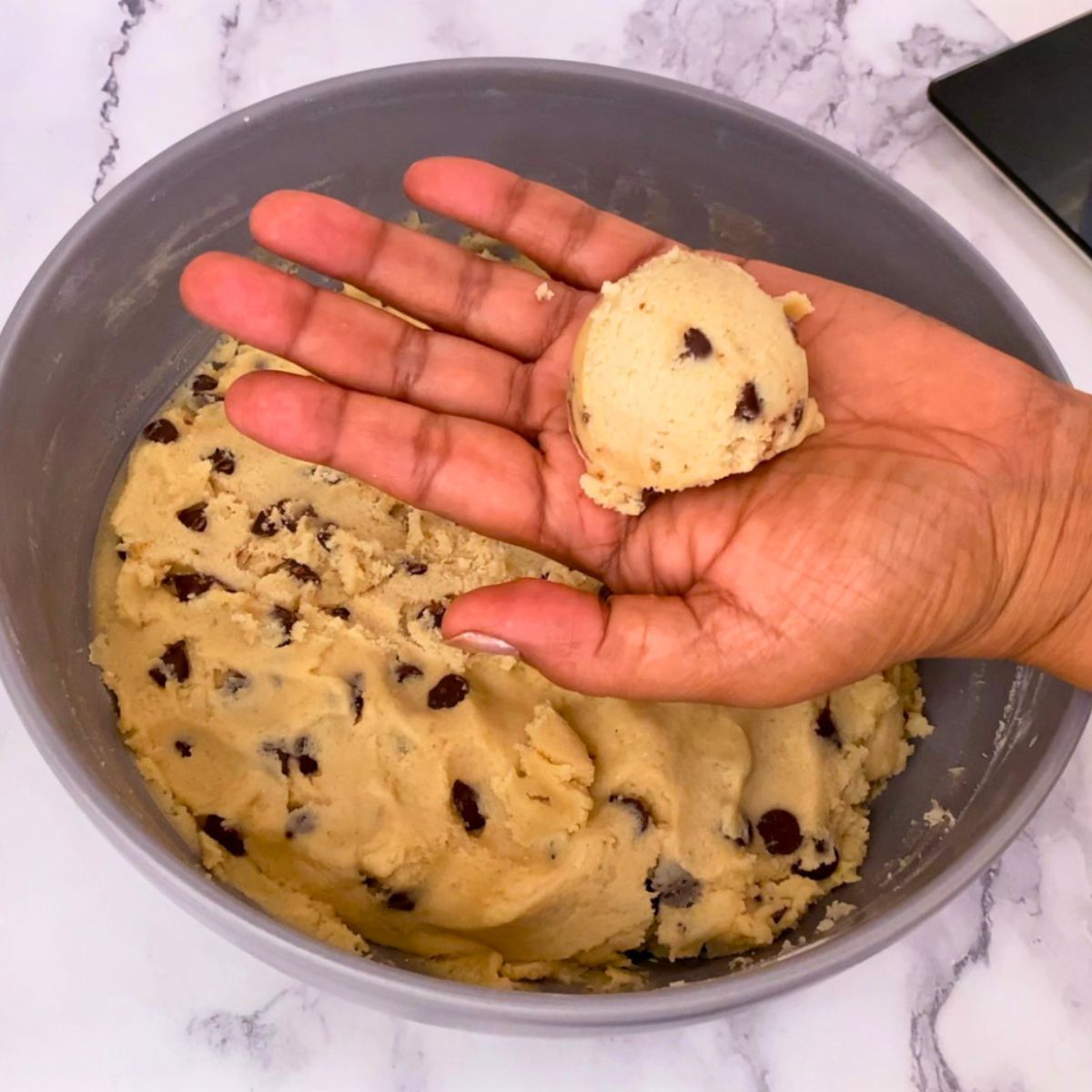 A bowl with cookie dough balls.