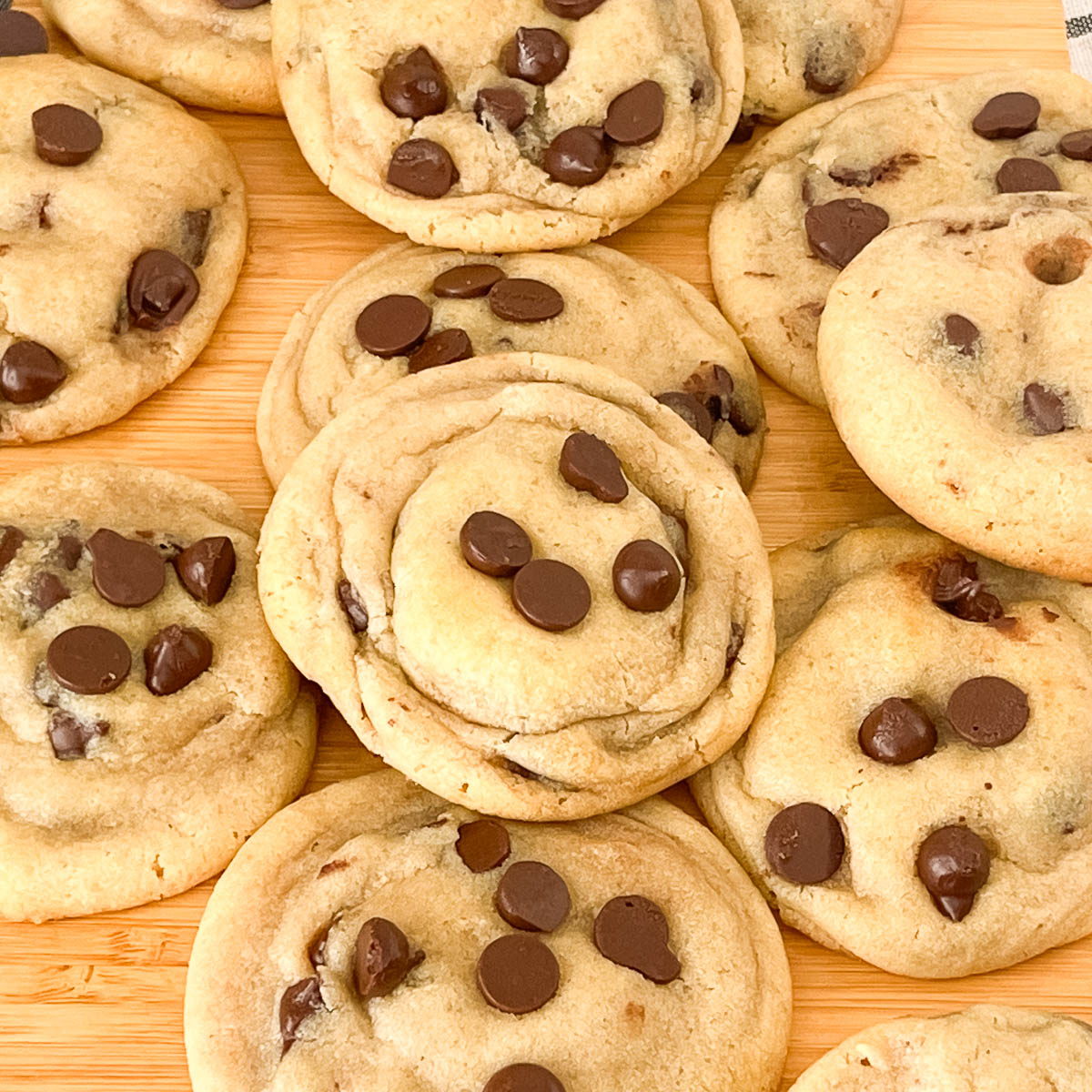 Fresh-baked chocolate chip cookies on the table.
