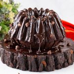 A chocolate frosted bundt cake.