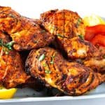 Baked tandoori quarters on the platter.
