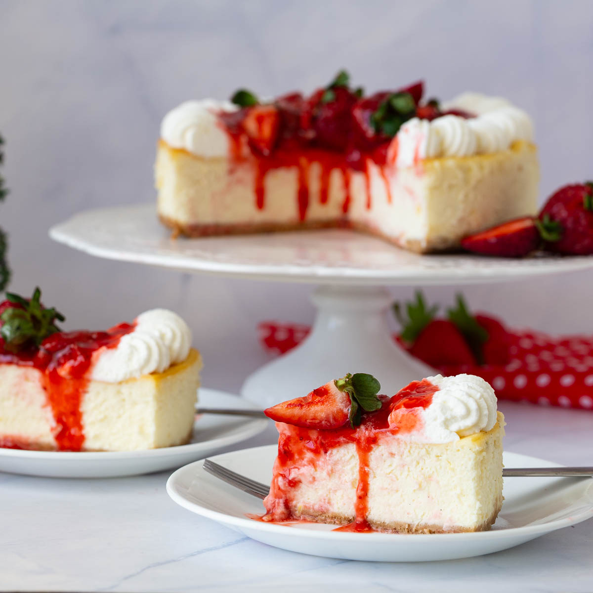 Baked strawberry cheesecake with slices.