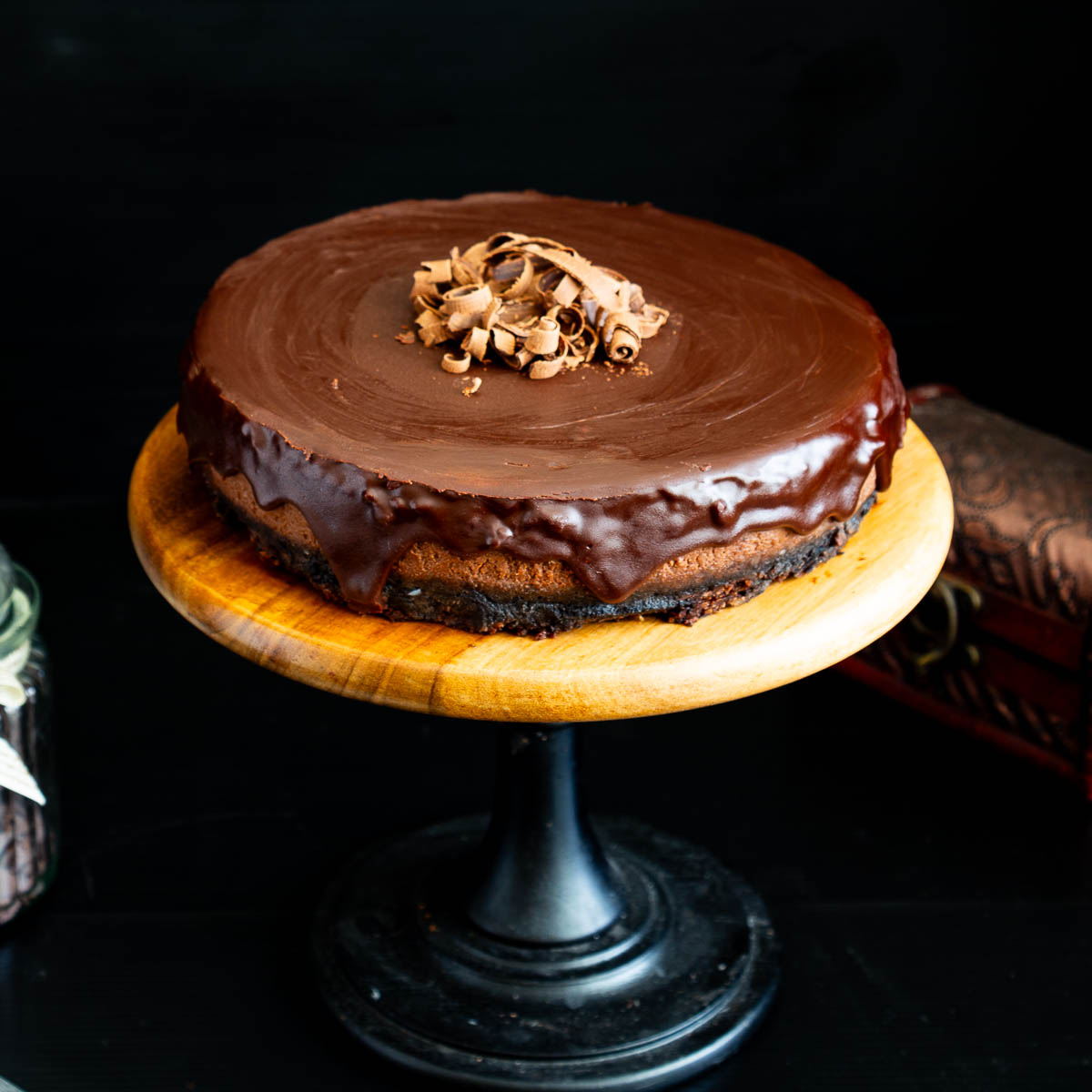 A baked chocolate cheesecake on the table.