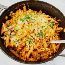 A ground beef casserole with cheese and pasta.