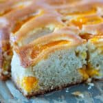 A sliced apricot coffee cake.