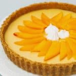 Pinterest image for mango panna cotta tart.
