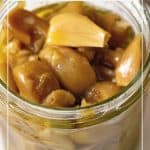 A jar with roasted garlic cloves.