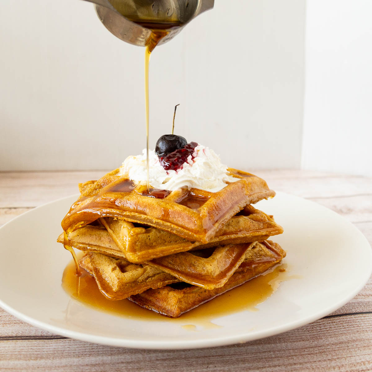 Pumpkin Waffles with Whipped cream.