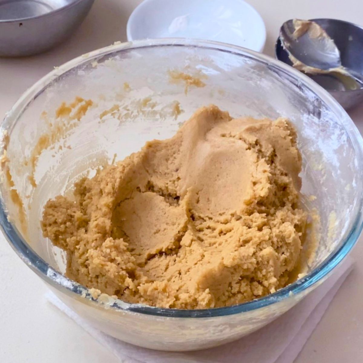 Tahini cookie dough in a bowl.