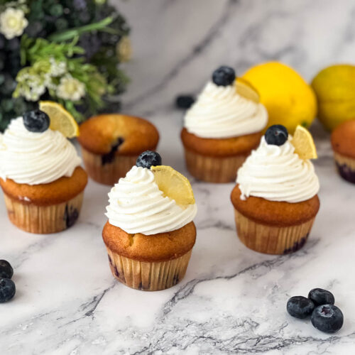 Frosted cupcakes with lemon and blueberry.