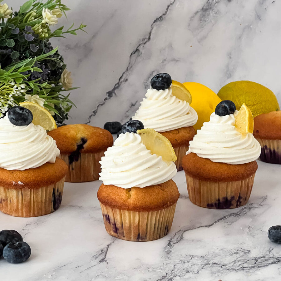 Frosted lemon blueberry cupcakes.
