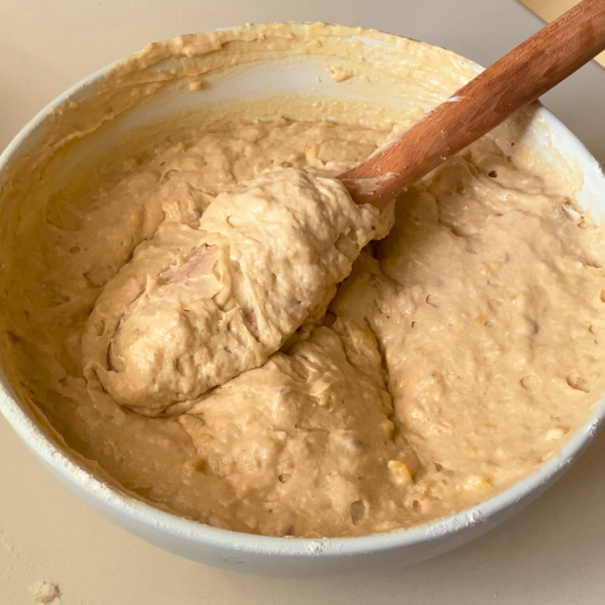 A big bowl with banana cake batter.