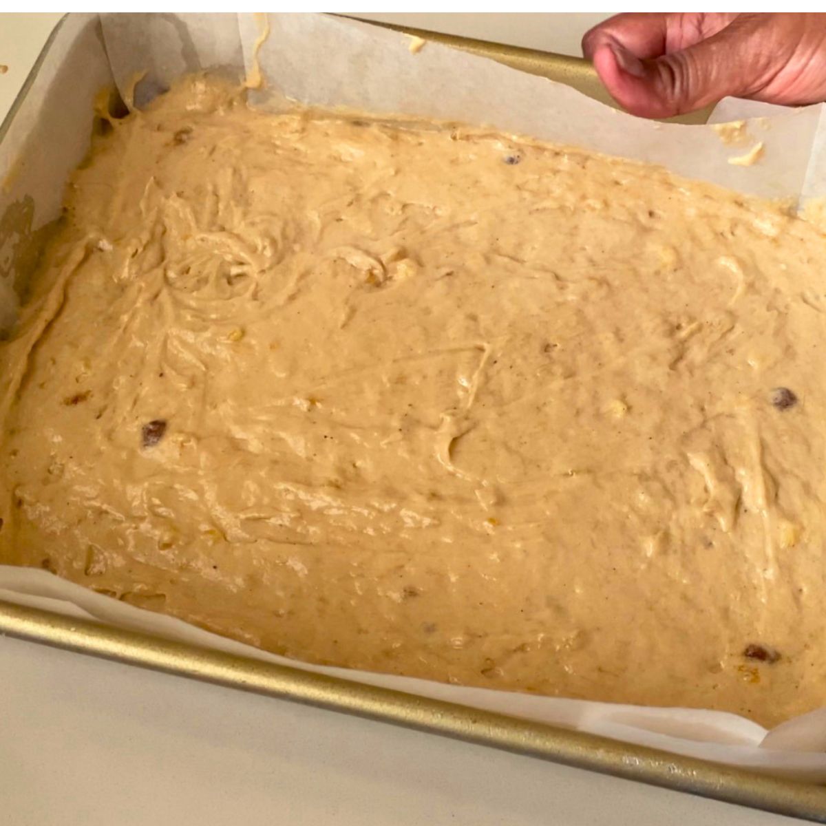 A sheet cake with banana cake batter.