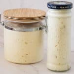 Two jars with starters for sourdough.