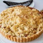 A Dutch apple pie on a plate.