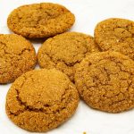 A stack of cookies on a table.