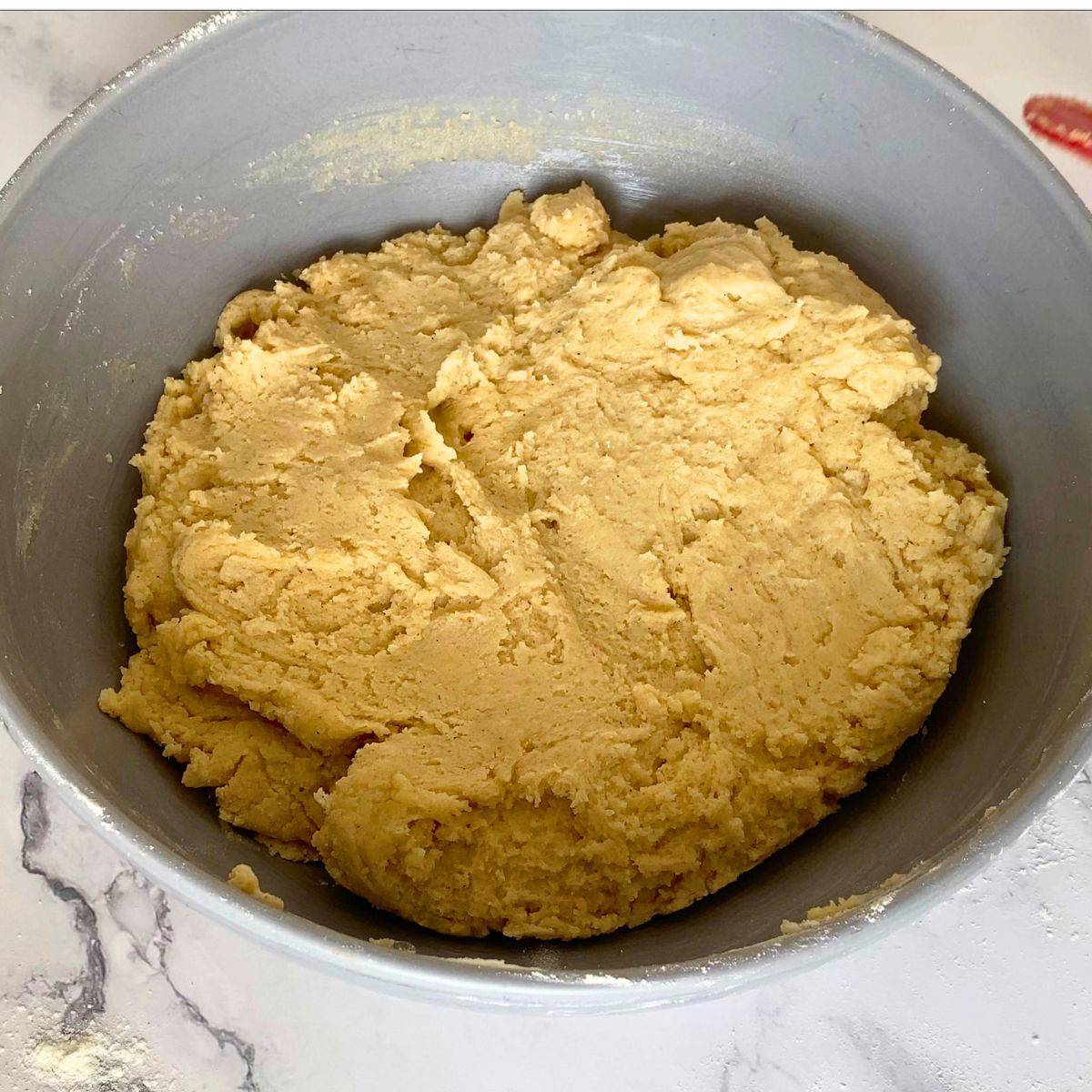 Snickerdoodle cookie dough in a bowl.