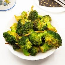 A bowl with sauteed broccoli.