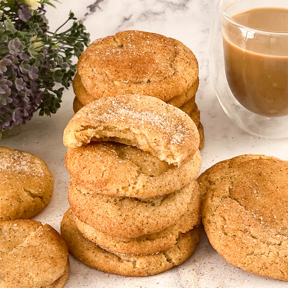 A stack of snickerdoodle cookies on a tray.