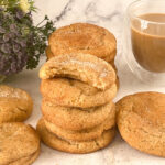 A stack of snickerdoodle cookies on the table.