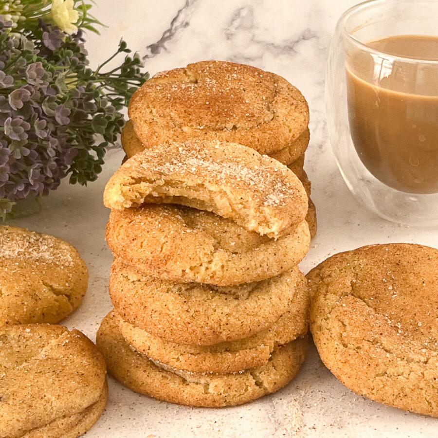 A stack of snickerdoodle cookies on the table.