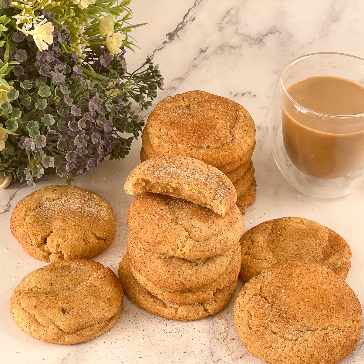 A stack of snickerdoodle cookies on the table.