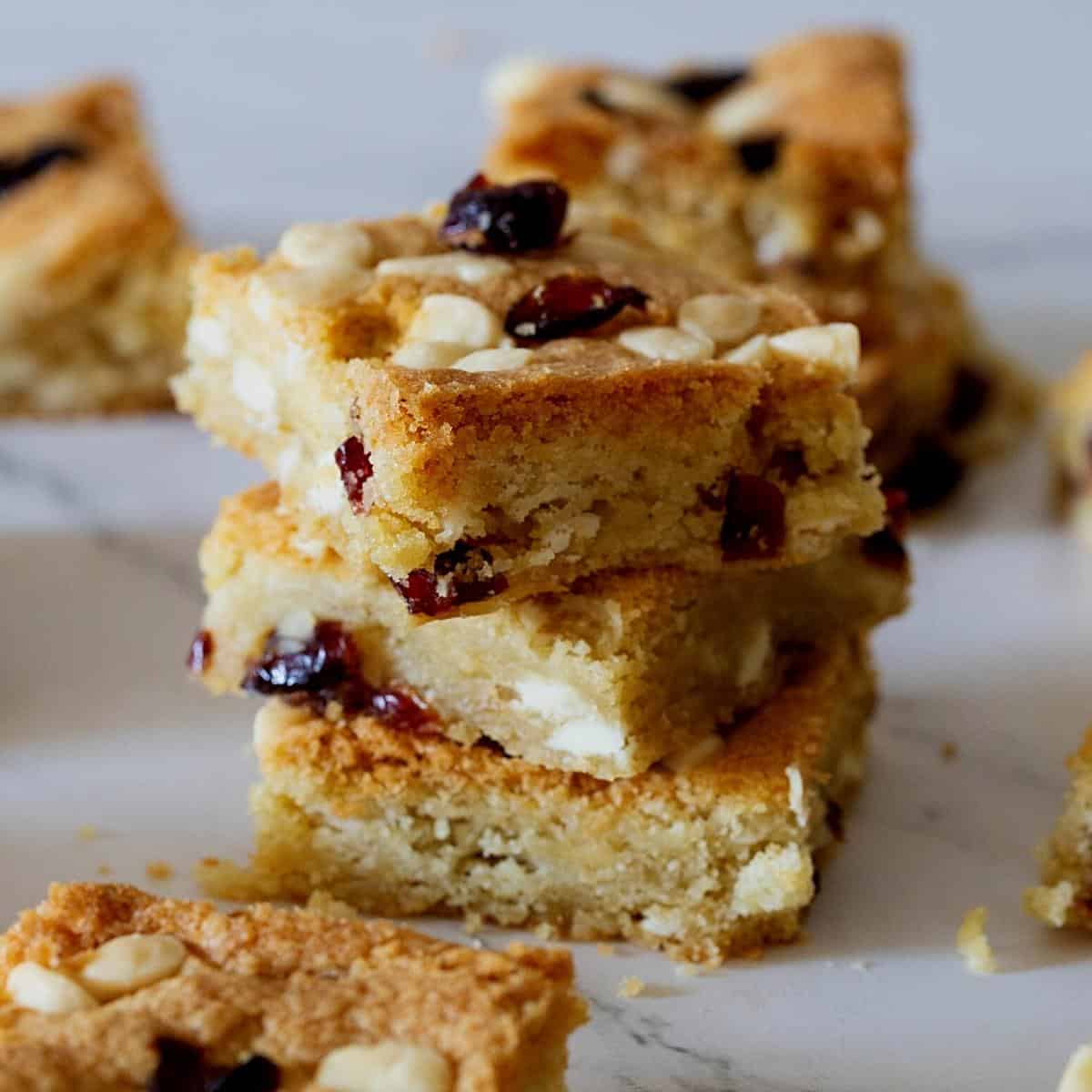 Stack of bars on a cranberry and white chocolate.