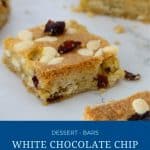 Pinterest image for white chocolate cranberry cookie bars.