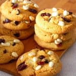 White chocolate cranberry cookies on a table.