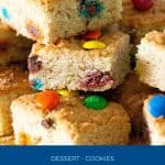 Pinterest image for M&M bars with cookie dough.